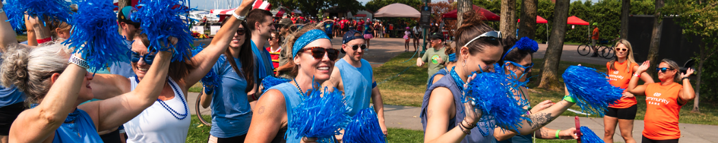 Group of volunteers cheering for fun